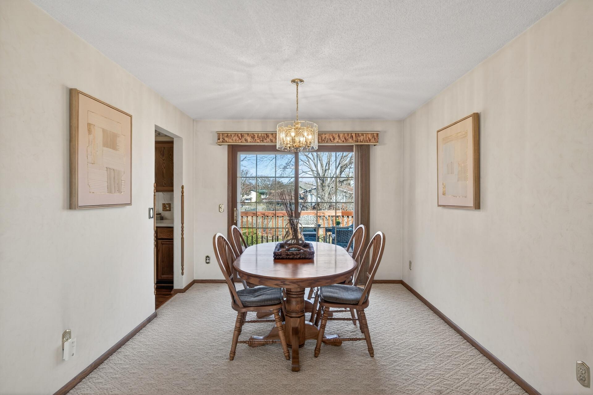 Your living space is easily extended with a convenient walk out from your dining space to your spacious deck with stair access to the backyard.