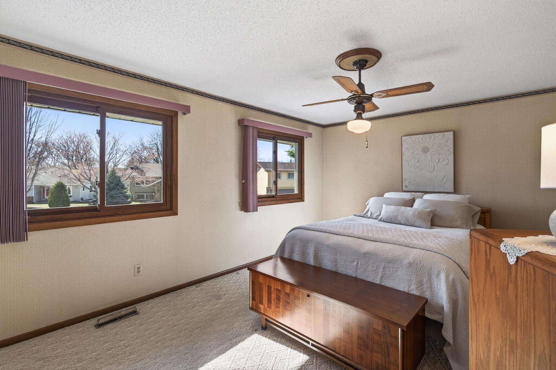 The primary bedroom is very spacious with neutral carpet (professionally cleaned) and double windows to let the natural light shine in!