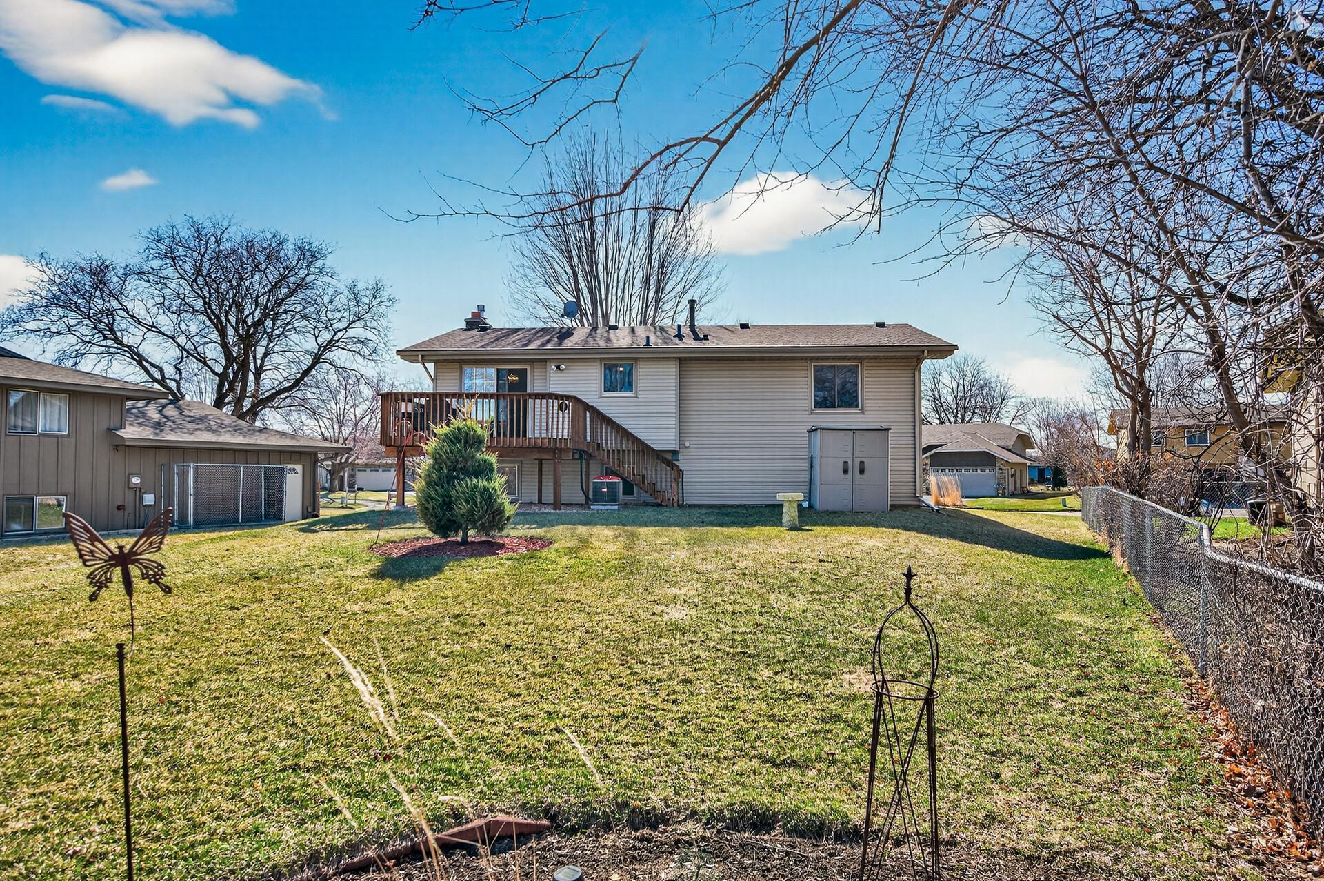 Fabulous deck with stairs delivers easy access to the backyard from the house. The bonus shed provides additional storage and space to keep you organized.