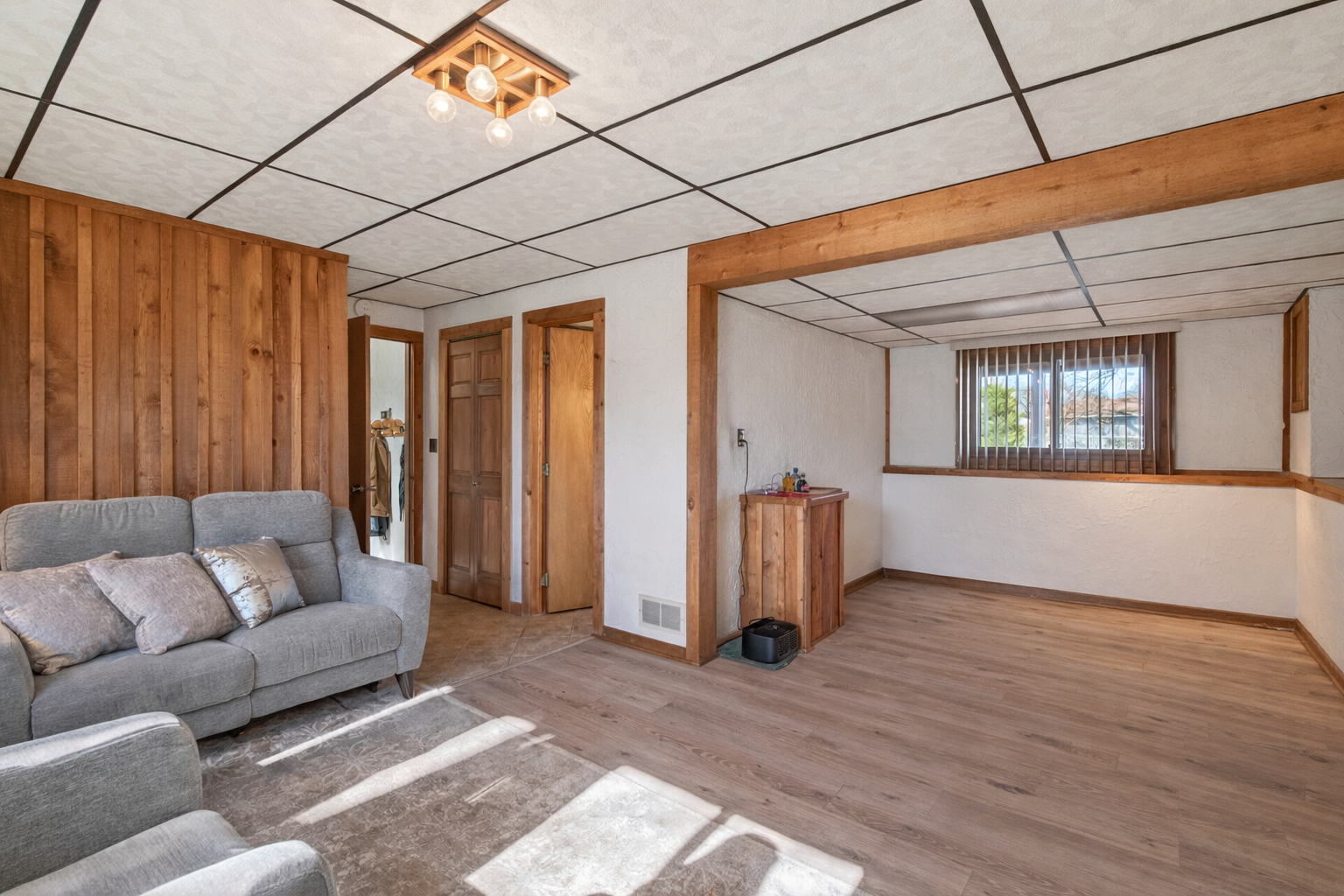 Extended area showing the current wet bar. This could easily be removed or embraced with your own vision for the space.