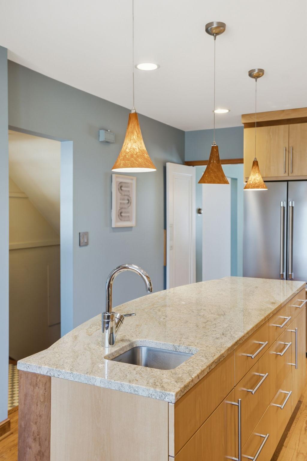 Gorgeous pendants above island