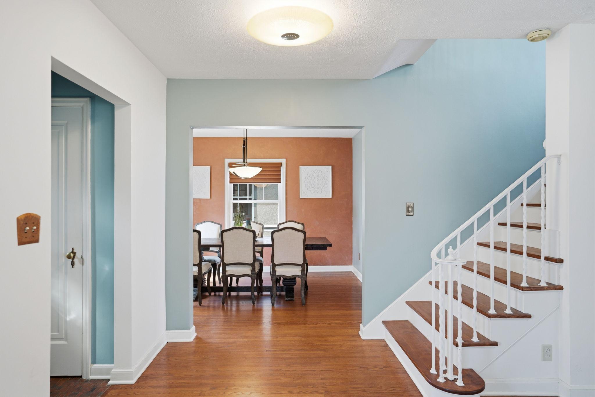 Adjacent to living room is a large formal dining space