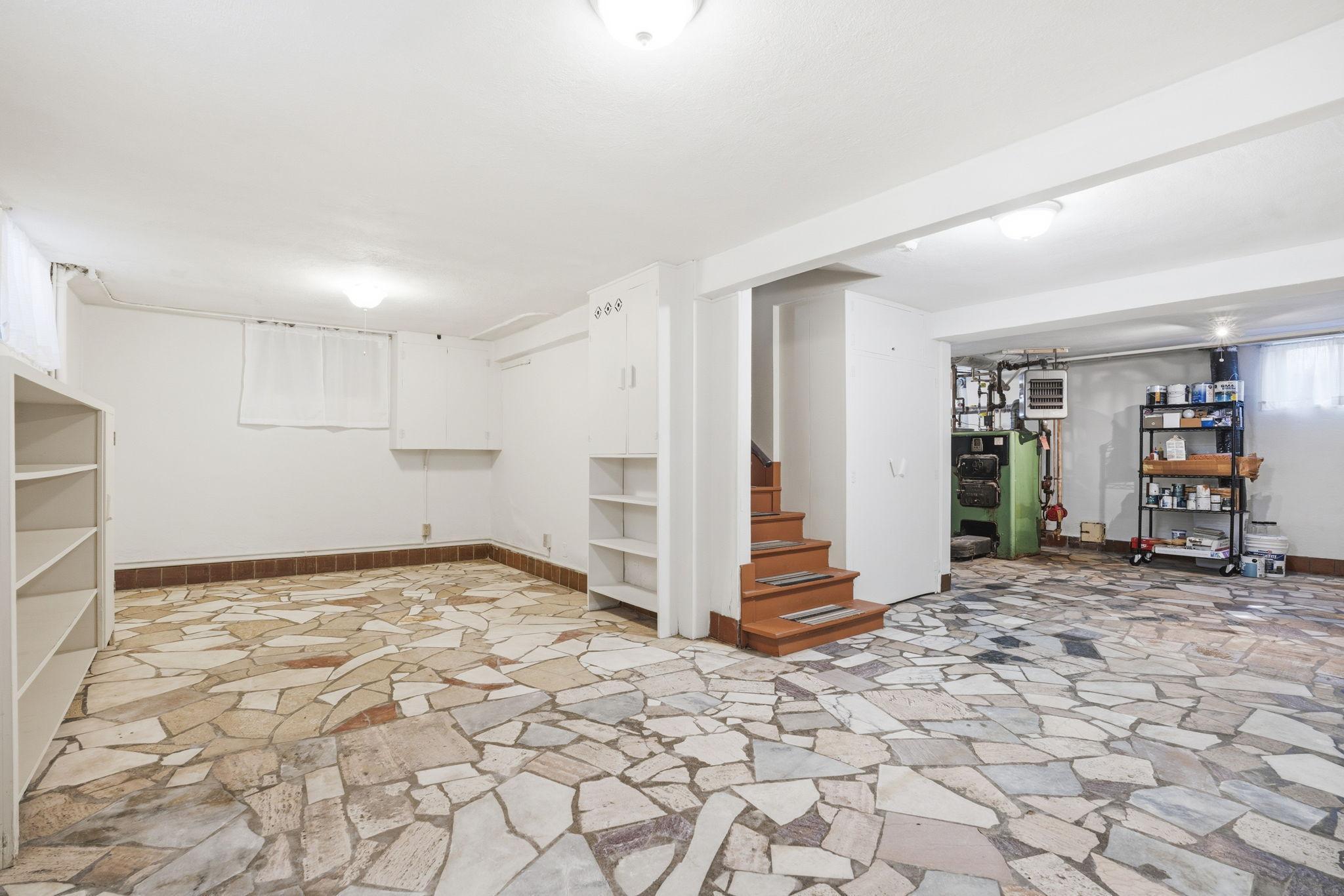 The lower level granite was brought over from a St. Paul hotel