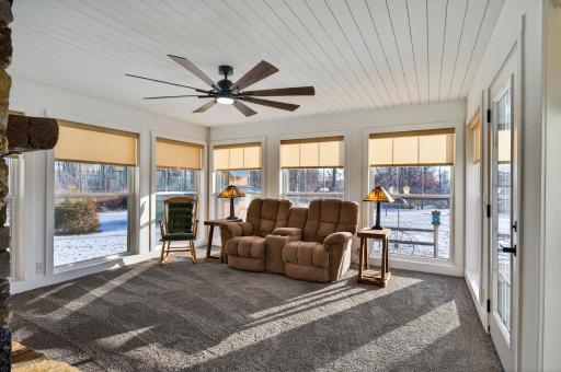 New 4-season sunroom completed in 2025 provides expansive views of the amazing property