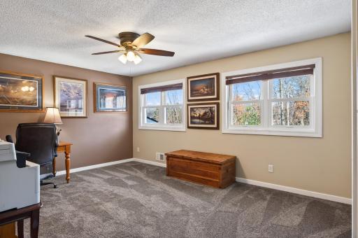 The spacious upper level 3rd bedroom is currently being used as an office