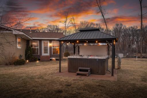 Enjoy the 6 person hot tub all 4 seasons with the shade pergola and winter curtain