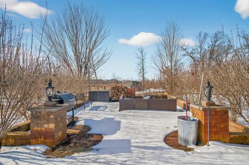 Another view of the paver patio with fire pit-it looks amazing in the summer months!