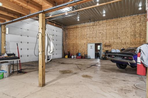 In addition to the 40x40ft space and loft is a 40x32ft cold storage area with concrete and 200 amp electricity. The entire pole building has its own sand point well and holding tank septic.