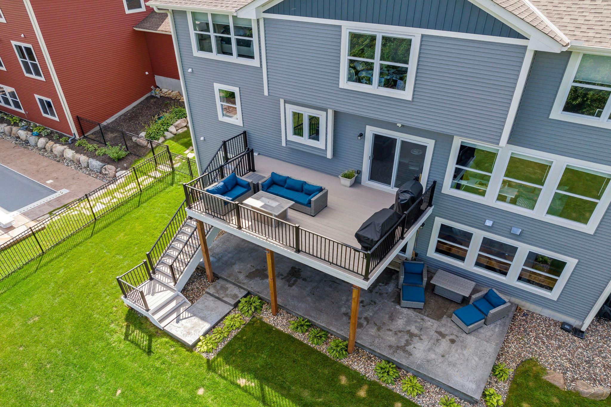 Enjoy outdoor living at its finest with a new composite deck and stamped concrete patio, both added in 2023. These thoughtfully designed spaces provide the perfect setting for relaxing, entertaining, and taking in the backyard views.
