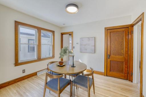 Informal dining room is can accommodate a number of table shapes and sizes.