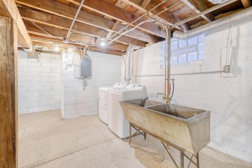 New clothes washer and clothes dryer in the laundry area.