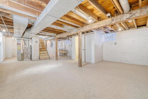 The basement features seven-foot ceilings, with the furnace and laundry conveniently at one end, leaving plenty of open space for storage or future finishing and a great opportunity to customize the area while adding value and building equity.