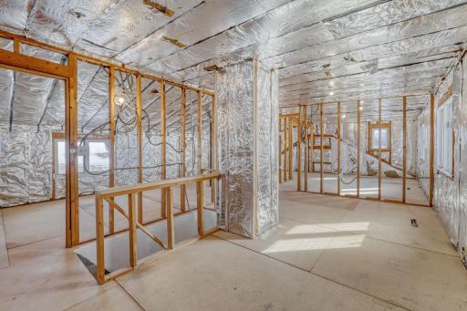 The entire upper level is a blank canvas, fully insulated and heated, ready for the next owners to customize while adding valuable equity.