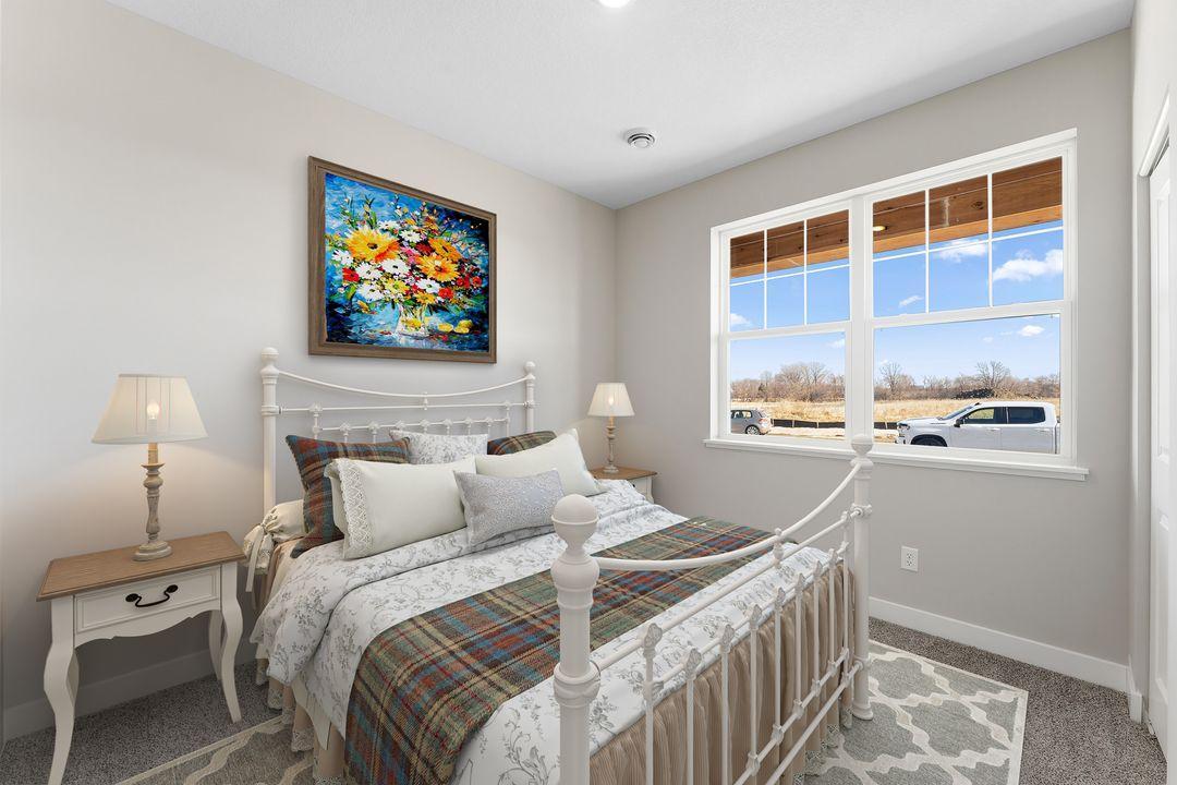 Harmony Bedroom 2. Photos are of similar staged home. Colors and options may vary. Ask Sales Agent for details.
