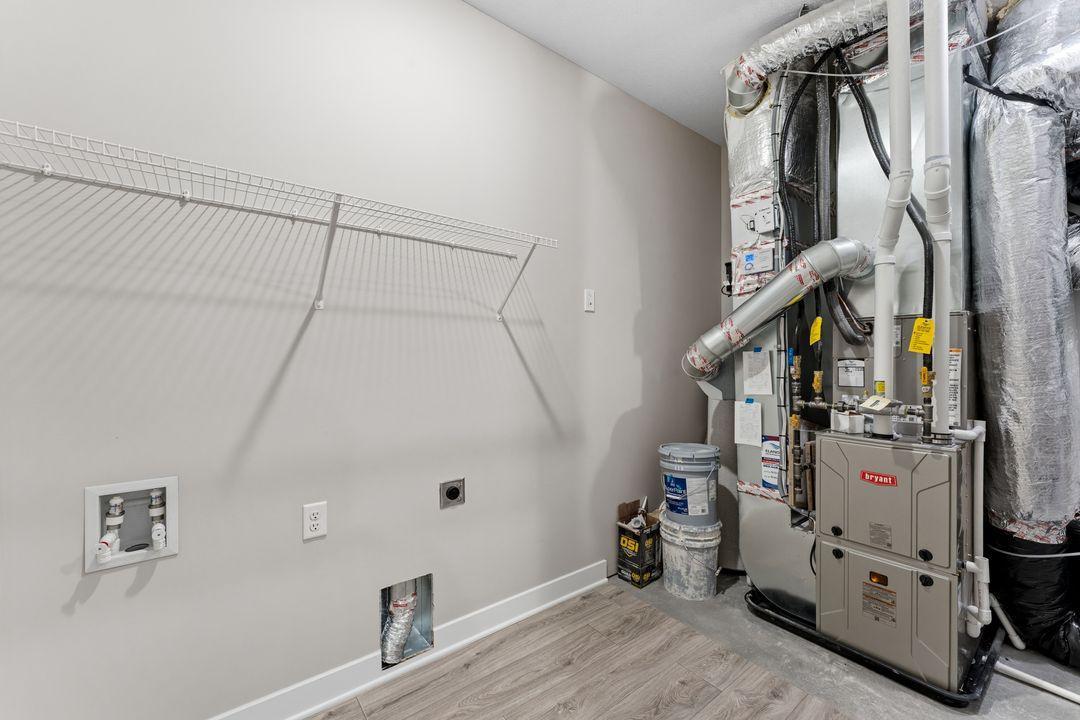 Harmony Utility Room. Photos are of similar staged home. Colors and options may vary. Ask Sales Agent for details.