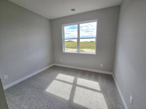 Harmony Bedroom 3. Photos are of actual home. Colors and options may vary. Ask Sales Agent for details.
