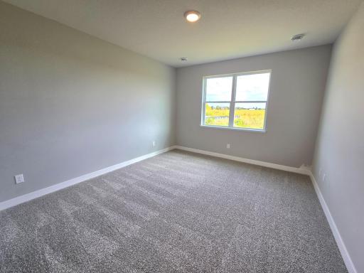 Harmony Primary Bedroom. Photos are of actual home. Colors and options may vary. Ask Sales Agent for details.