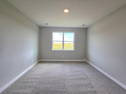 Harmony Primary Bedroom. Photos are of actual home. Colors and options may vary. Ask Sales Agent for details.