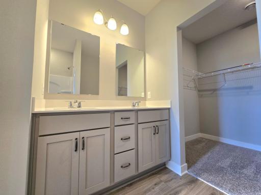 Harmony Primary Bathroom with dual sinks. Photos are of actual home. Colors and options may vary. Ask Sales Agent for details.