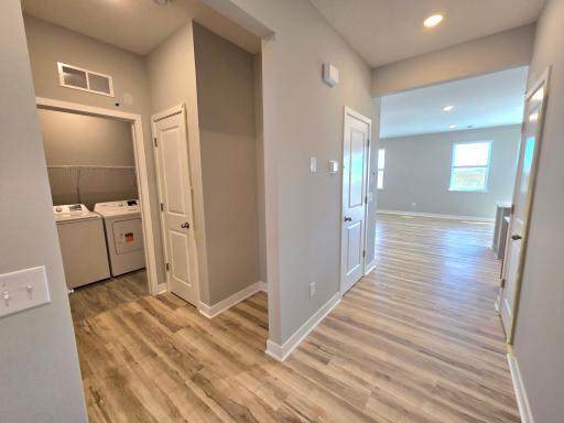 Harmony Garage Entry. Photos are of actual home. Colors and options may vary. Ask Sales Agent for details.