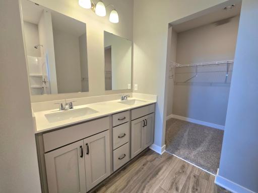 Harmony Primary Bathroom with dual sinks. Photos are of actual home. Colors and options may vary. Ask Sales Agent for details.