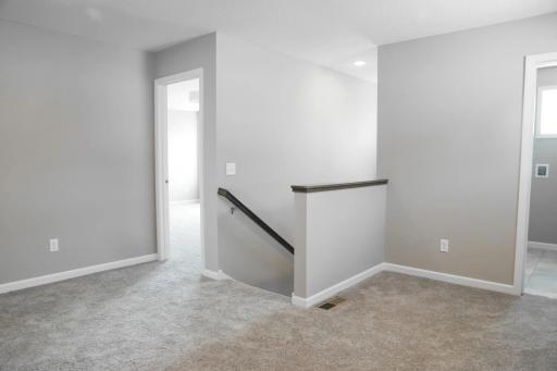 All photos of previously finished home of same floor plan.