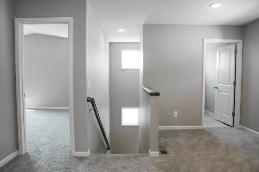 All photos of previously finished home of same floor plan.
