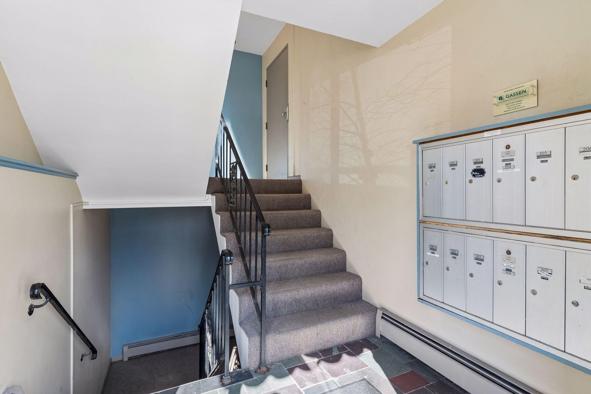 Downstairs to garden-level unit #102