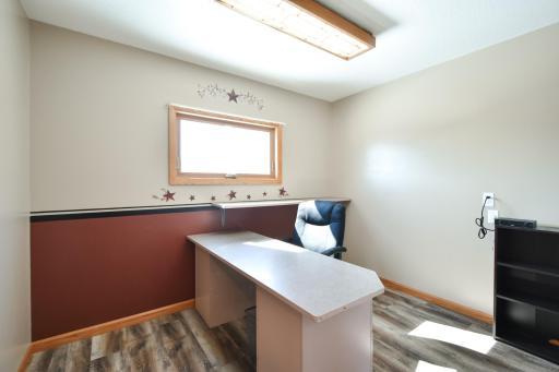 Vinyl planking that runs throughout the main level providing a very cohesive look throughout. Windows have been updated throughout on the main level.