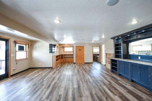 Light bright and open! Straight ahead is the ADA bathroom and the second door is a separate room that was currently used for an office.