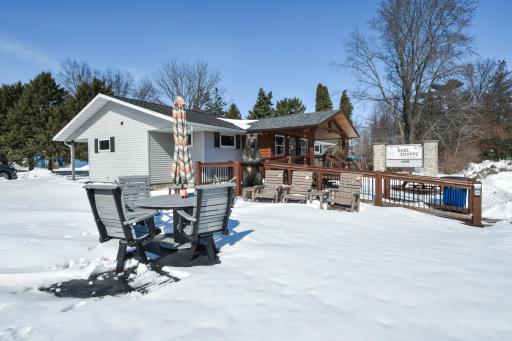 The snow has since left after these photos, call and take a look to see the lot, layout and bring your ideas. There is parking in front of the building as well.
