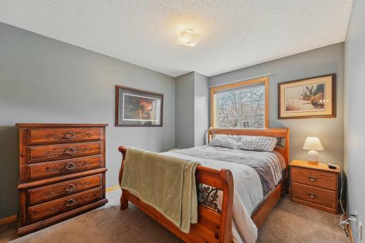The second bedroom is well-sized to comfortably accommodate guests or children.