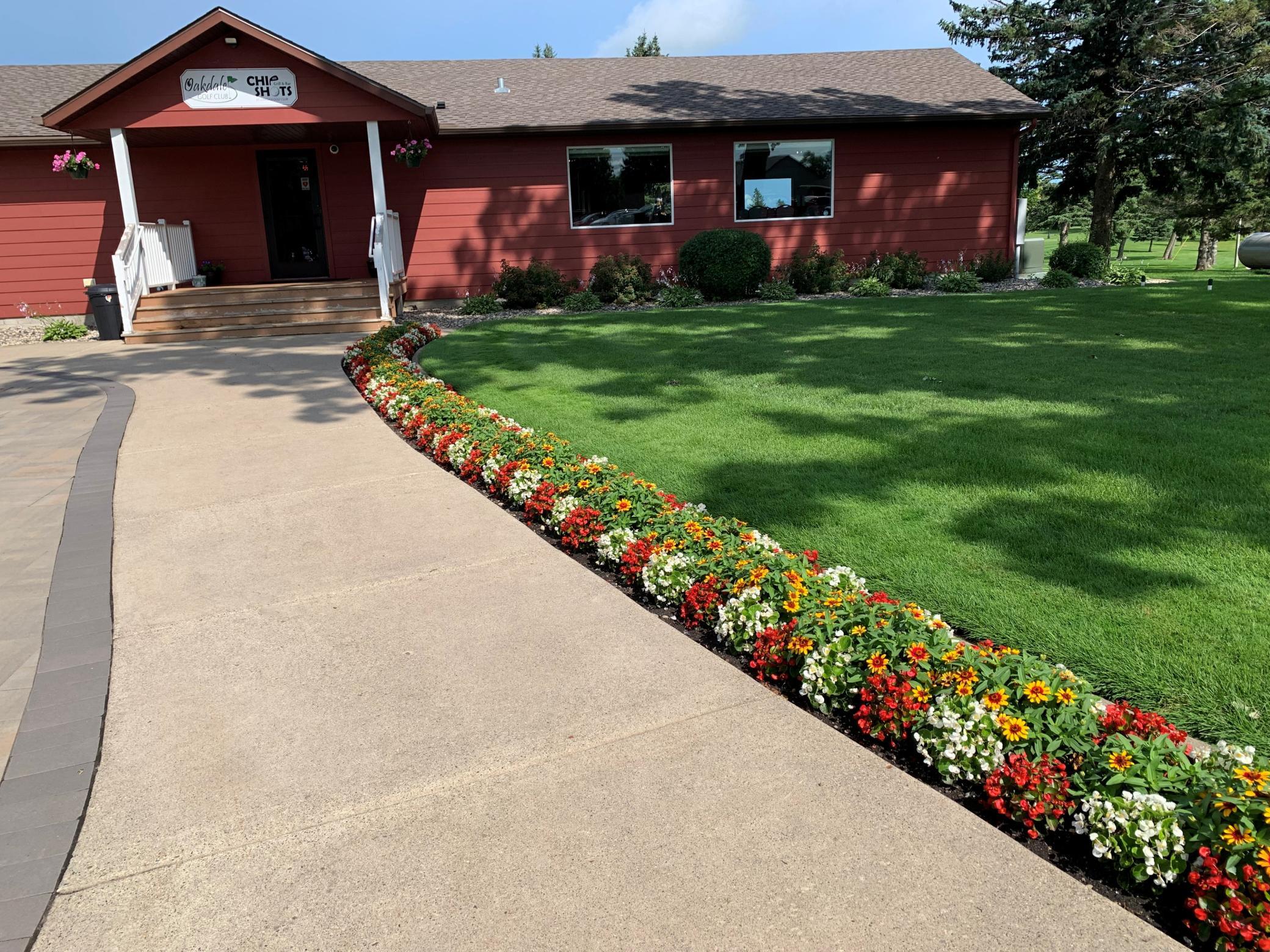 Clubhouse sidewalk July 2025
