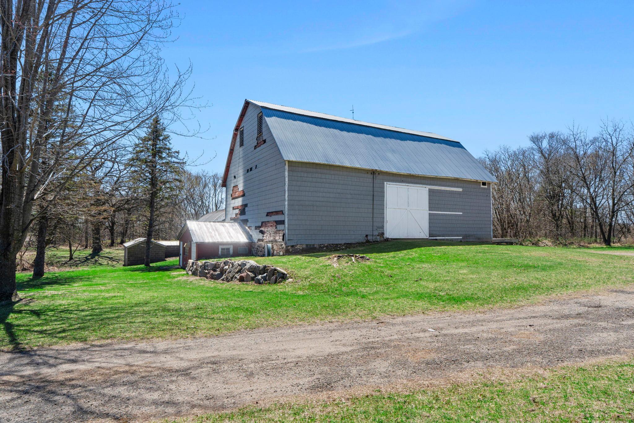 Storage and more- this 5,115 sf barn has all the space you need and more with an additonal building off the side