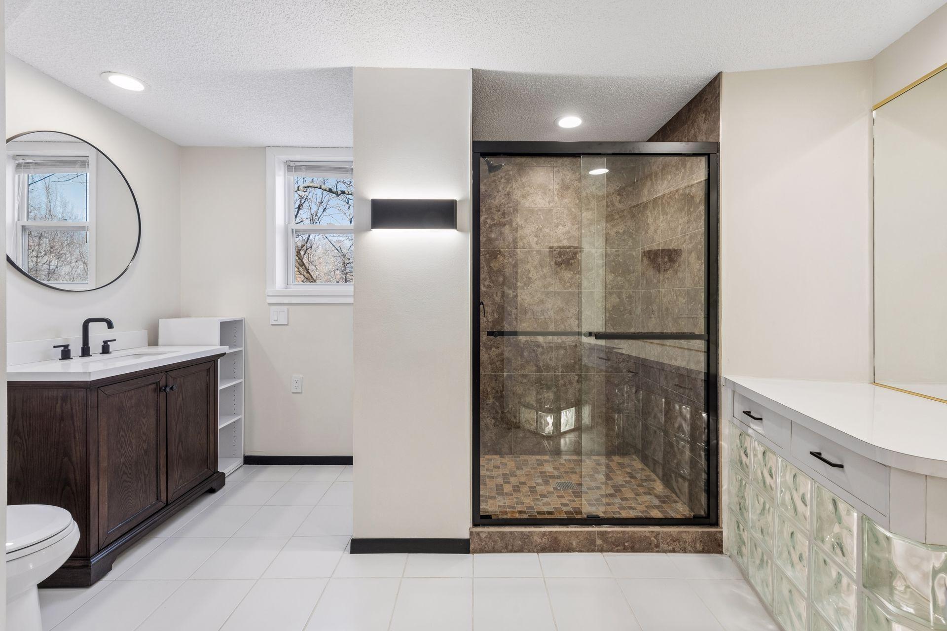 Basement bathroom with step-in shower.