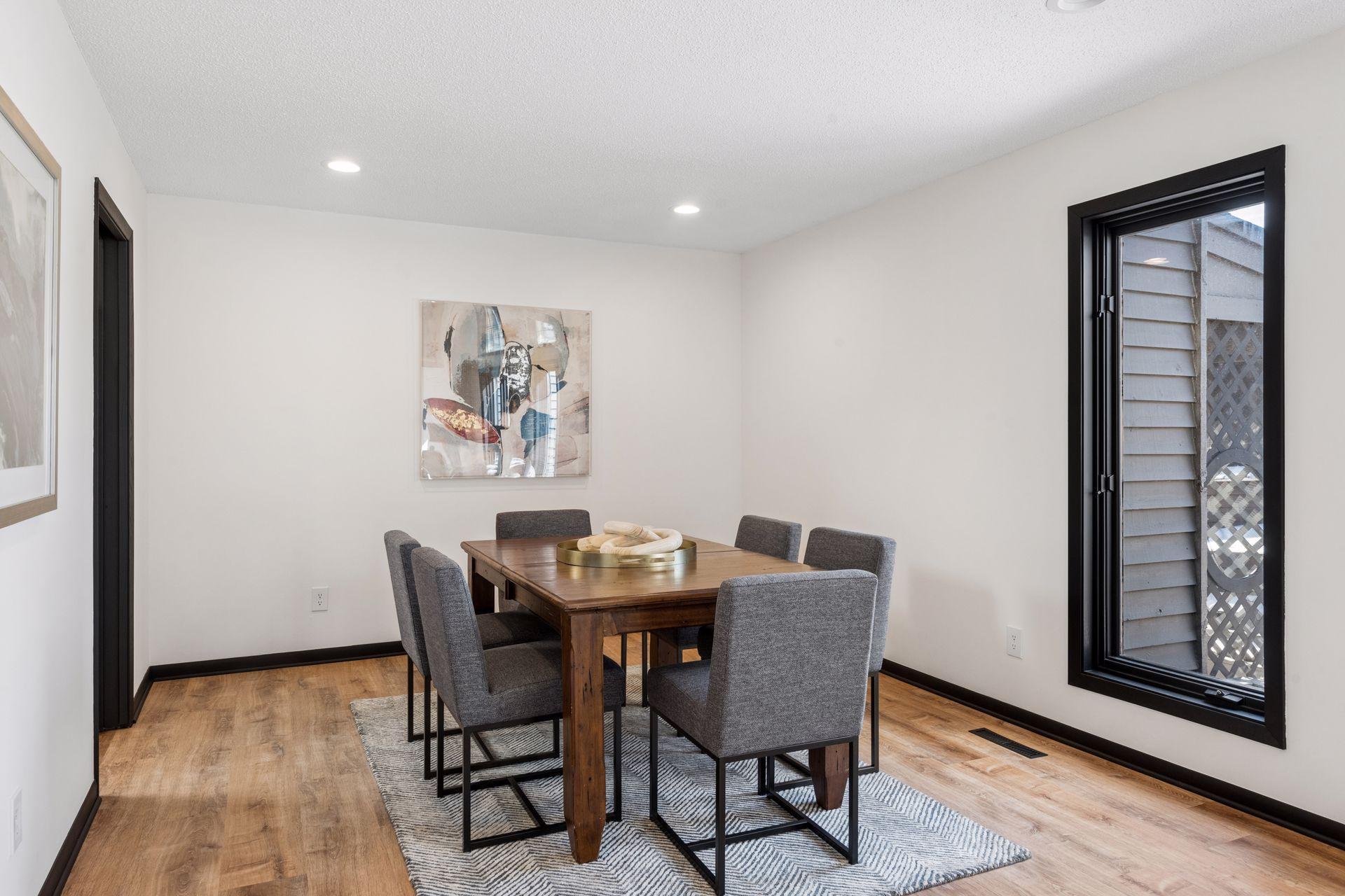Formal dining area, open to the large front living room.