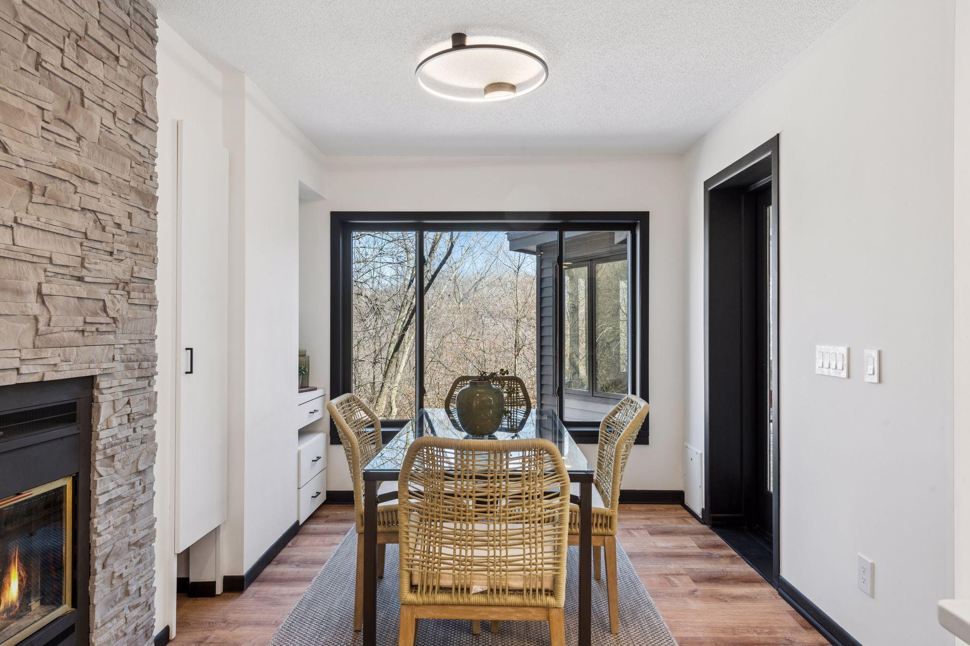 Informal dining with access to the three-season porch and deck.