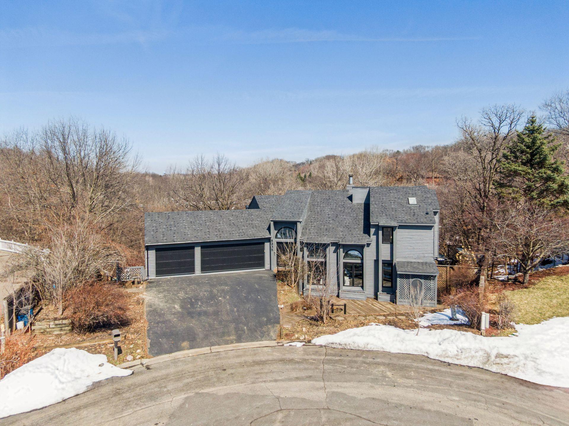 Welcome home to this spacious, nicely updated home with privacy and immediate access to nature and everyday amenities in an incredible location.