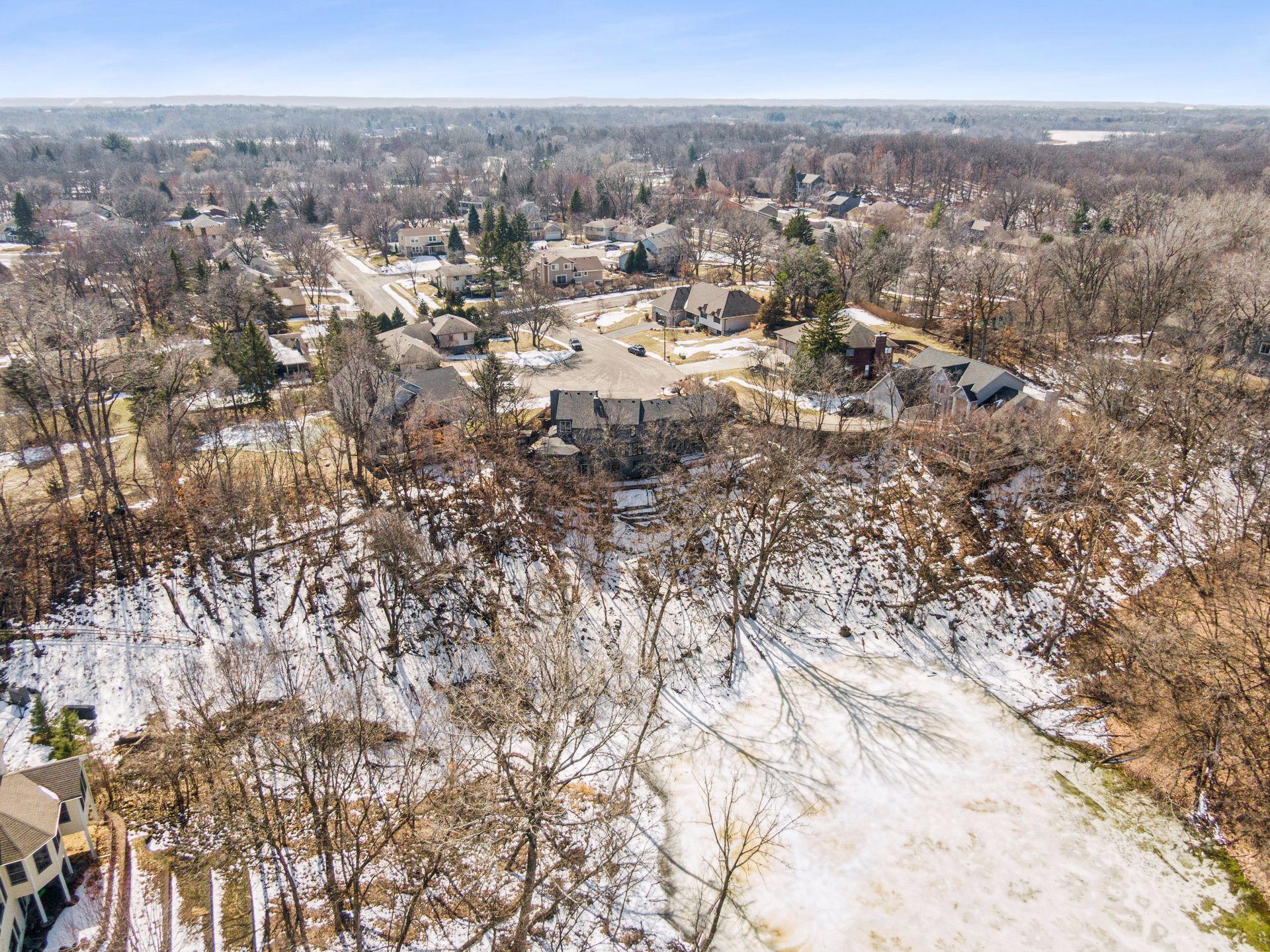 Surrounded by nature, set on a nearly half-acre lot overlooking a quiet pond.