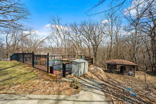 Above ground pool, recently updated with maintenance free decking and fencing. Needs some TLC.