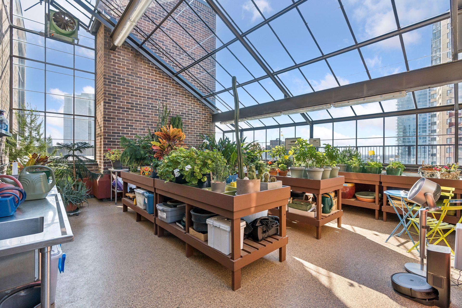 Take the elevator to floor 15 for the community greenhouse. Perfect for repotting your house plants & such
