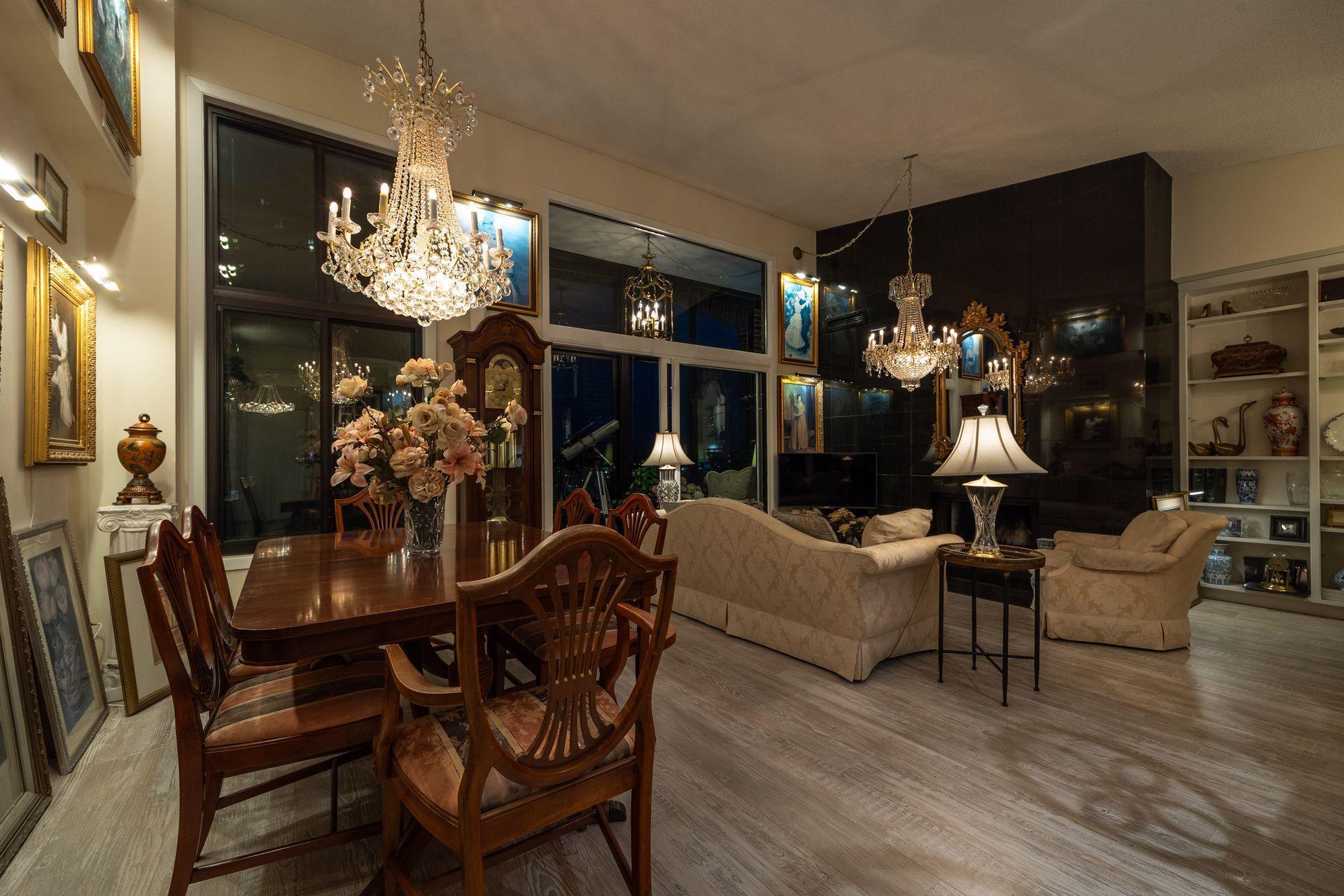 At night light dances off the reflections in the floor to ceiling granite fireplace wall and windows