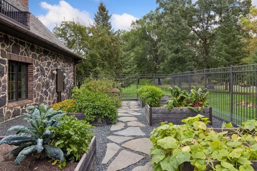 6 raised bountiful garden beds-Gardening shed inside garage just steps away