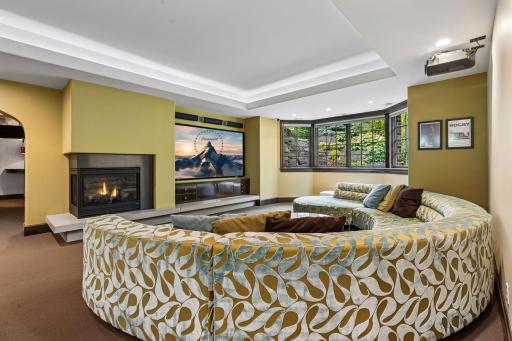 Family room w Large Television and Fireplace