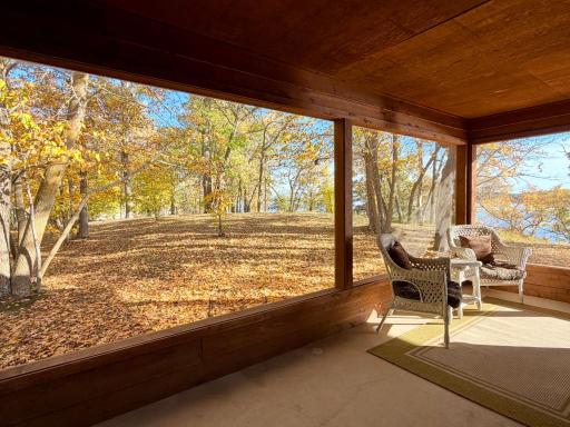 Step Out to a sunrise lake view right from the screened porch