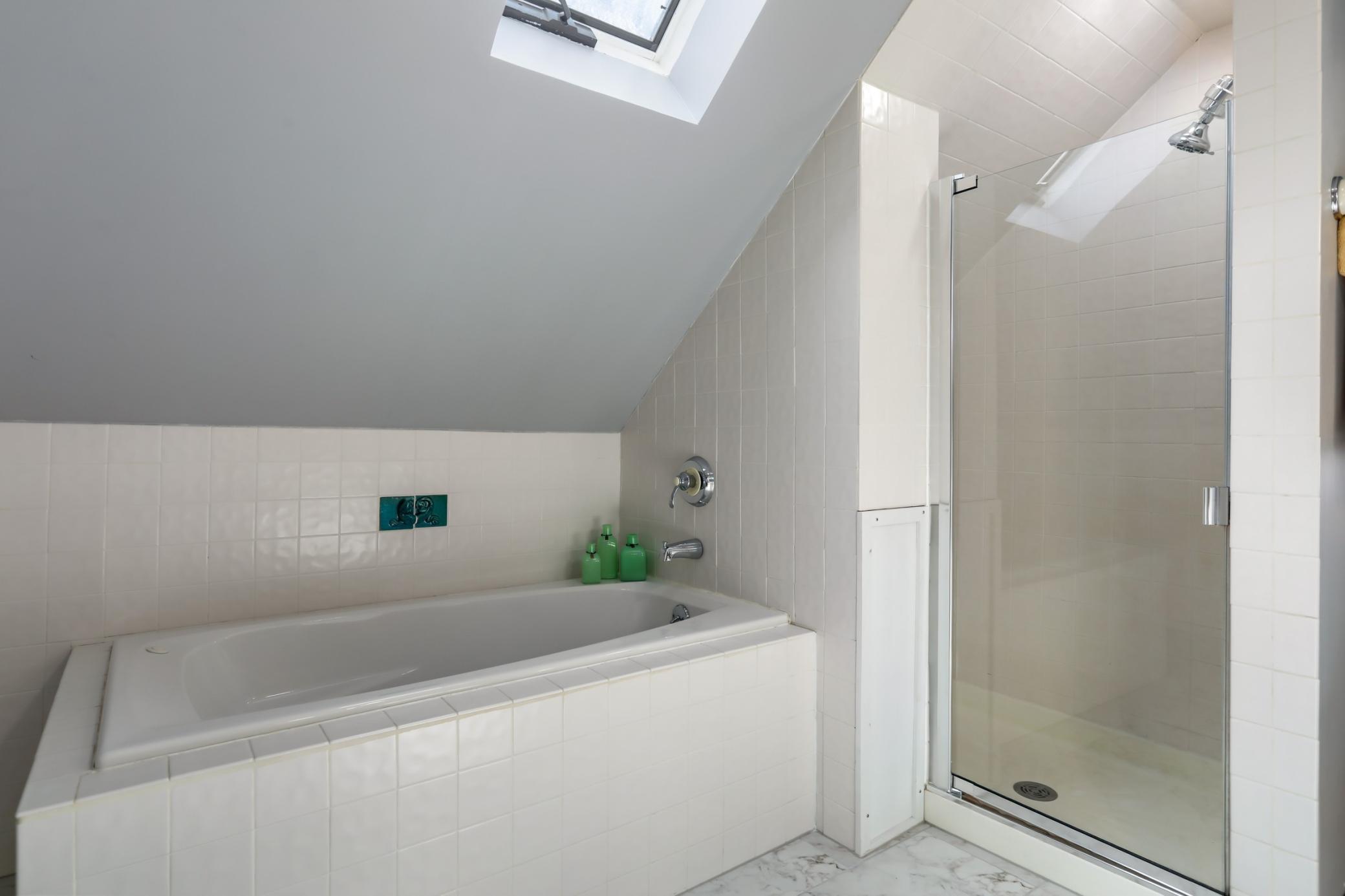 Upper Level Primary Suite! Features Full Bathroom, Closet Space, and Sitting Area!