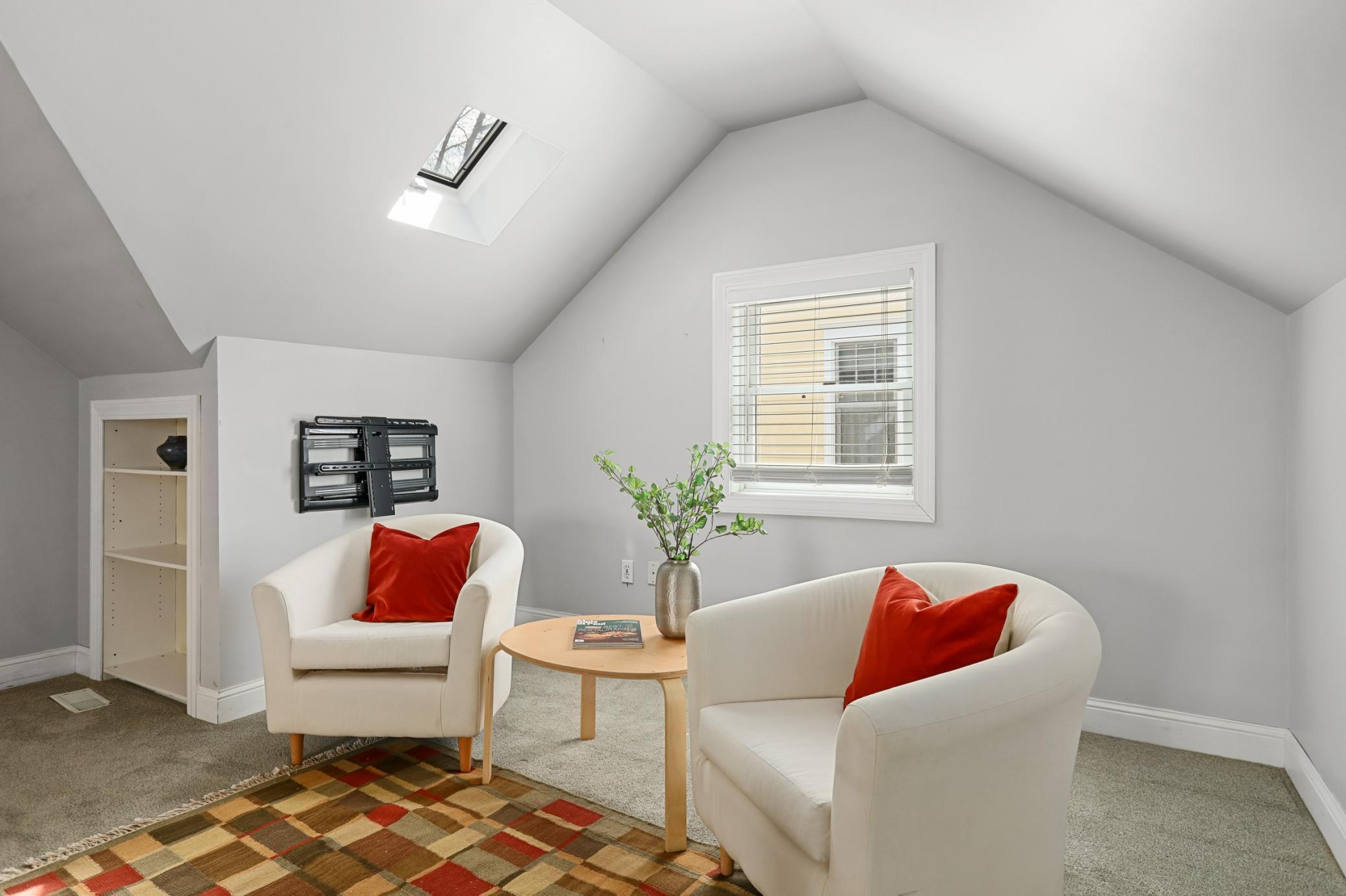 Upper Level Primary Suite! Features Full Bathroom, Closet Space, and Sitting Area!