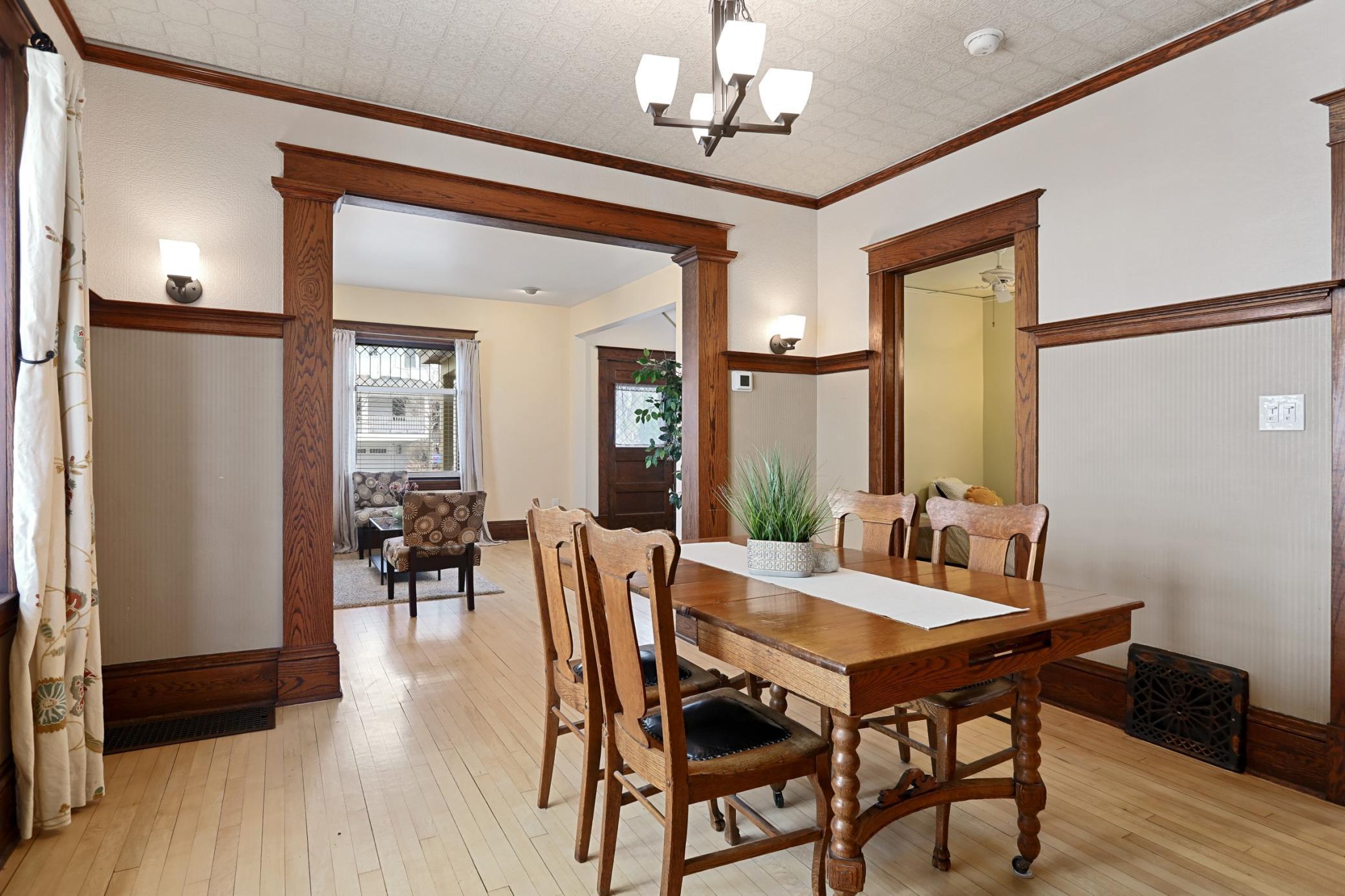 Gorgeous Woodwork in Dining Room, Featuring Built-in with Pass Through Into the Updated Kitchen!