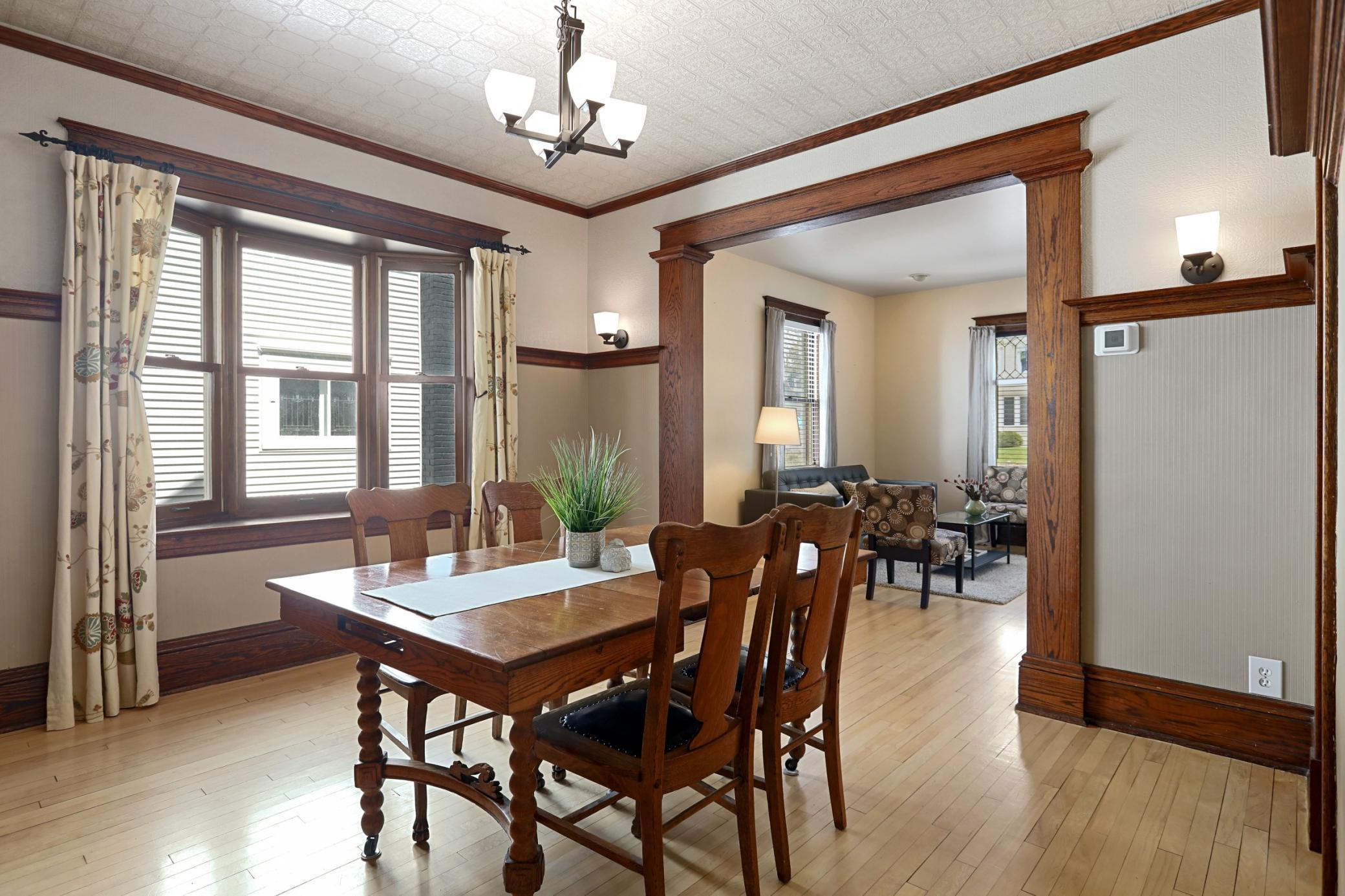 Gorgeous Woodwork in Dining Room, Featuring Built-in with Pass Through Into the Updated Kitchen!