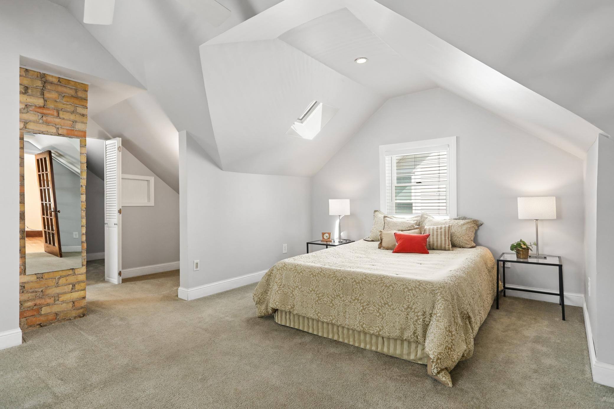 Upper Level Primary Suite! Features Full Bathroom, Closet Space, and Sitting Area!